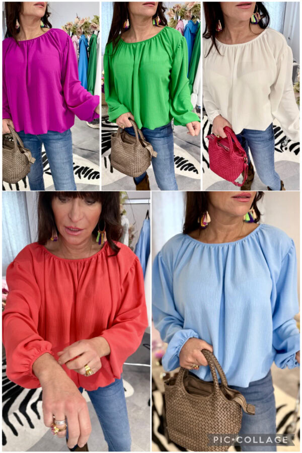 Blus med resår vid halsringning, nedtill och ärmslut, justerbar off-shoulder och ärmar, normal till rymlig passform på modell.