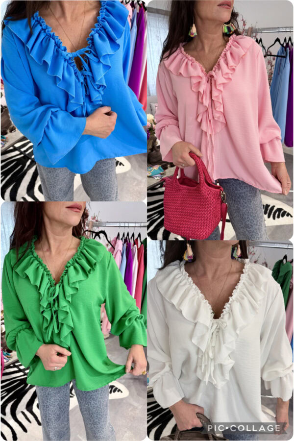 Blus med volanger vid hals och ärmslut, resår för justerbar off-shoulder-passform, normal till rymlig storlek på modell.