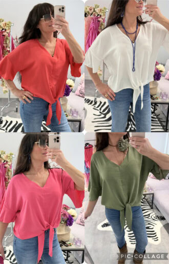 Blus med knyte nedtill och trekvartslång volangärm på modell, lättburen och feminin passform.