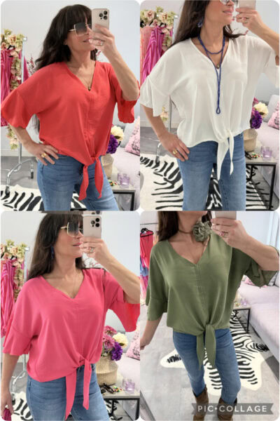 Blus med knyte nedtill och trekvartslång volangärm på modell, lättburen och feminin passform.