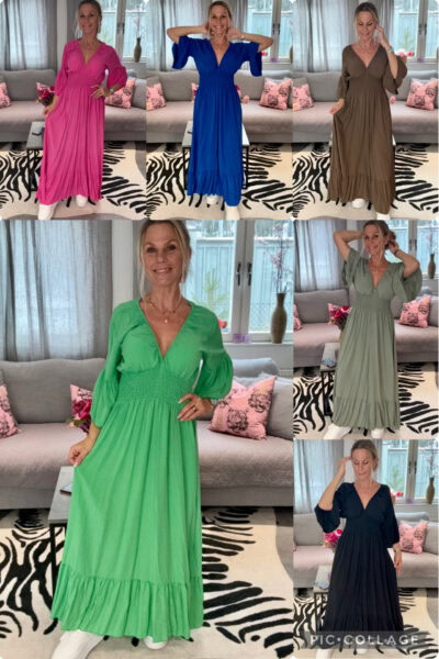 Klänning i 100% viskos med smock under byst, volang nedtill och bohemiska ärmar, på modell, normal passform.