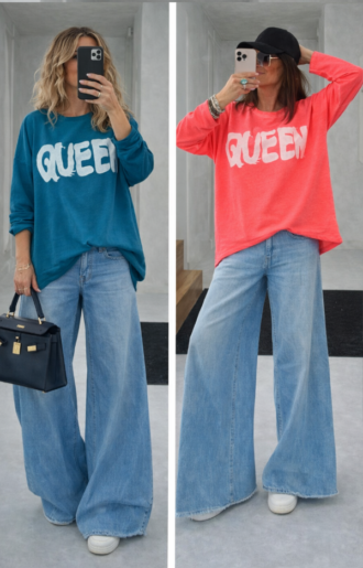 Oversize t-shirt topp i bomull med QUEEN-tryck på bröstet, längre bak än fram och med långa ärmar.