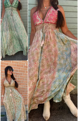Bohemsk luksuskjole med halterneck, broderier og paljetter over bysten i en elegant sommerstil.